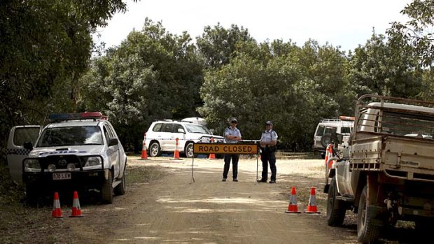 Police seal off Kings Road, Glass House Mountains on the Sunshine Coast while a search is conducted for the remains of Daniel Morcombe.
