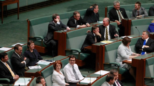 Prime Minister Julia Gillard votes in vain against the opposition amendment to standing orders that went to a division.