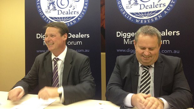 Integra managing director Chris Cain and Silver Lake managing director Les Davis explain their long courtship, which culminated in the signing of a takeover deal between the neighbouring gold miners in a Kalgoorlie house last night.