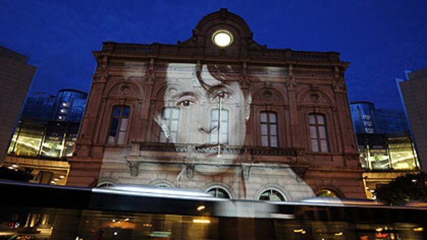 United vision ... an image of Aung San Suu Kyi is displayed on the European Parliament's building at Place du Luxembourg in Brussels in support of the campaign calling for her release.