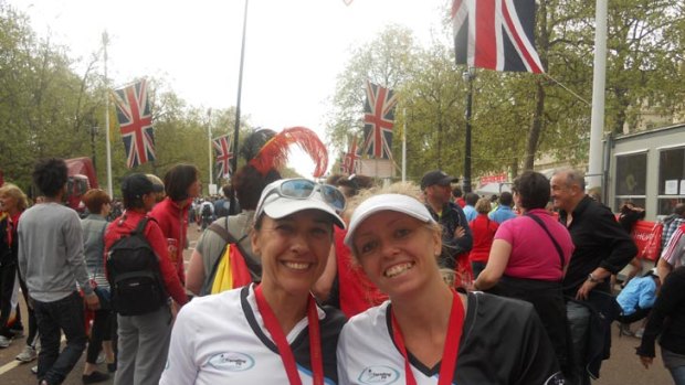 Mari-Mar Walton and colleague Tina Lambert after finishing the London Marathon.