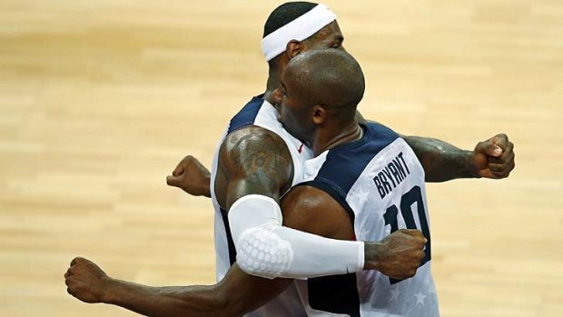 Through to the semis ... Lebron James, left, and Kobe Bryant celebrate victory.