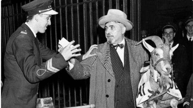 Curse of the Billy Goat: William Sianis is escorted out of game four of the 1945 world series. He put a curse on the Cubs, who have never a world series since.