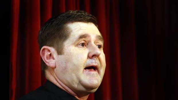 Father Chris Riley . . . upset after Graham West's resignation.