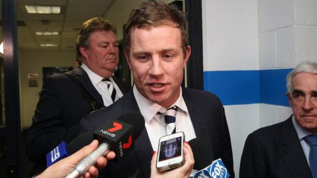 A clearly relieved Steve Johnson speaks to the media after his tribunal hearing on Tuesday.