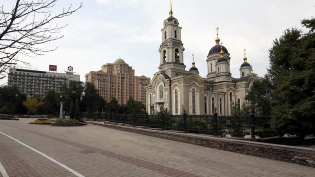 An empty street is seen in central Donetsk.