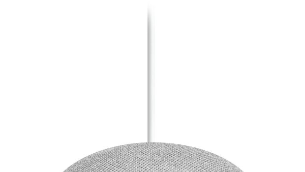 The Google Home Mini features touch-sensitive controls under the cloth cover.