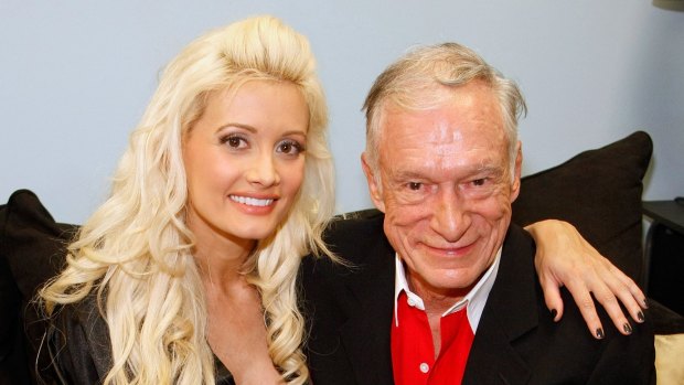 Squalid scenes: Holly Madison and Playboy founder Hugh Hefner in 2009.