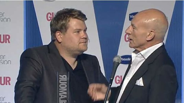 Awkward exchange ... James Corden and Patrick Stewart at the Glamour Awards.