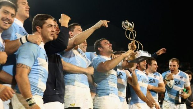 Pumas captain Agustin Creevy and team mates celebrate after their historic win.
