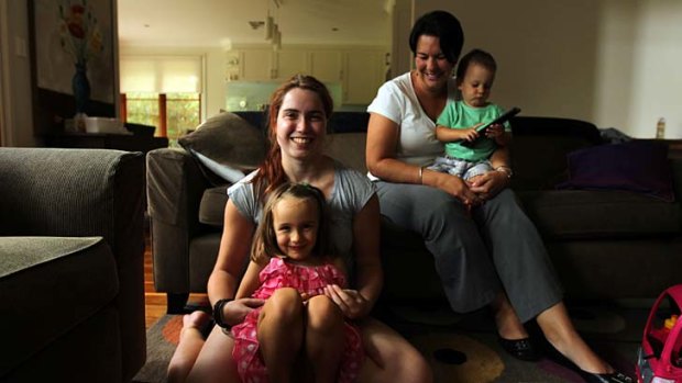 Livia McKinley (rear) and her au pair, German teenager Katharina Stemweddel, with the family's children, Freya, 4, and Owen, 1, at their home in Sydney.