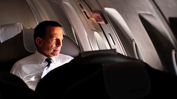 The Opposition Leader Tony Abbott en route from Melbourne to Sydney yesterday.