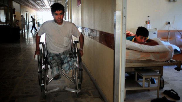 Nineteen-year-old Abu Saleh, who lost both his legs in the battle for Qusayr in Syria, in a wheelchair in a hospital in Lebanon.
