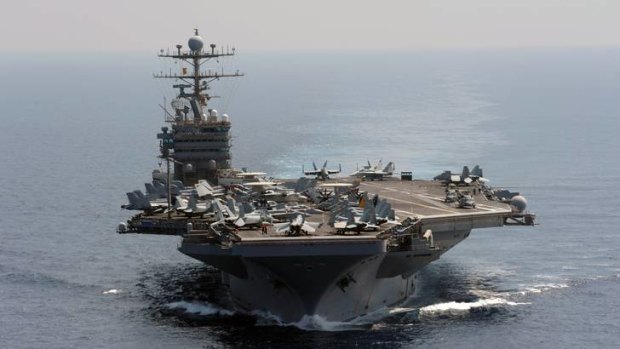 The Nimitz-class aircraft carrier USS Abraham Lincoln transits the Indian Ocean.