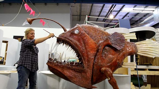 Dental work ... Australian Museum preparator Tina Mansson readies an oversized model anglerfish for the Deep Oceans show.