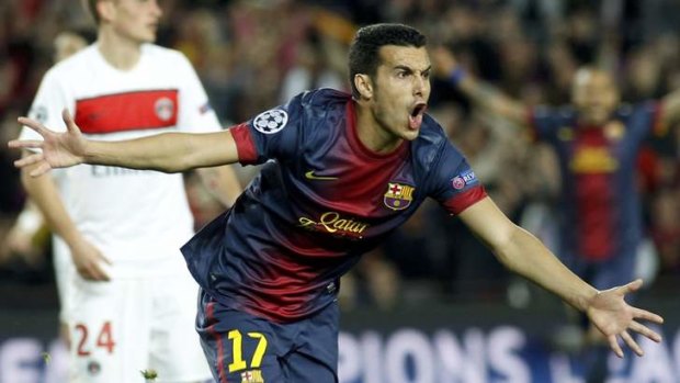 Barcelona's Pedro Rodriguez celebrates after scoring against Paris St Germain.