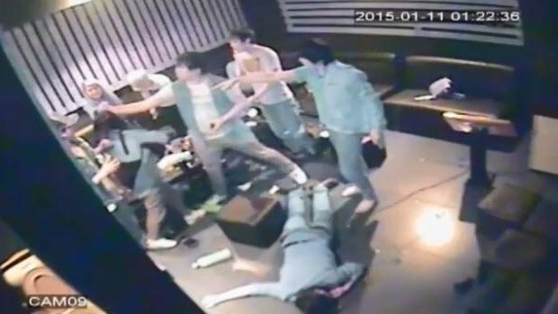 A gang attack a young couple at a Melbourne karaoke bar.