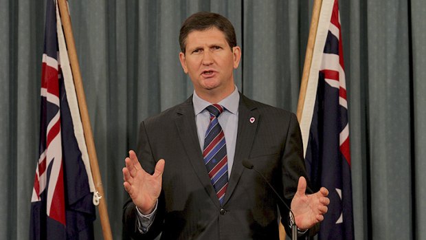 Health Minister Lawrence Springborg speaks to the media today about job cuts within his department.