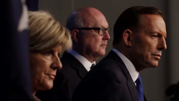 Prime Minister Tony Abbott with Foreign Minister Julie Bishop and Attorney-General Senator George Brandis says data storage could be used to fight general crime not just terrorism.