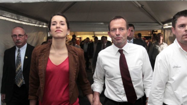 Opposition leader Tony Abbott and daughter Louise in Mackay, Queensland, today.