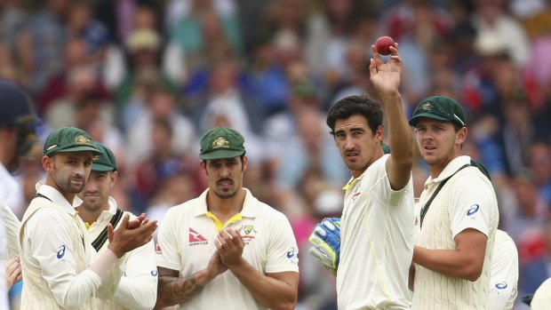 Mitchell Starc holds the ball aloft after claiming his fifth wicket on day two of the fourth Test.