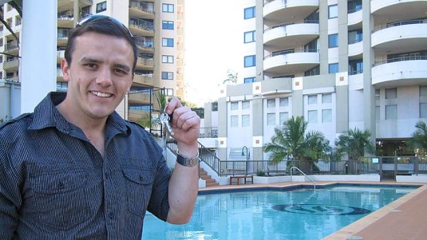 Simon Hamill shows off the pool at the Oasis Apartments in Auchenflower.