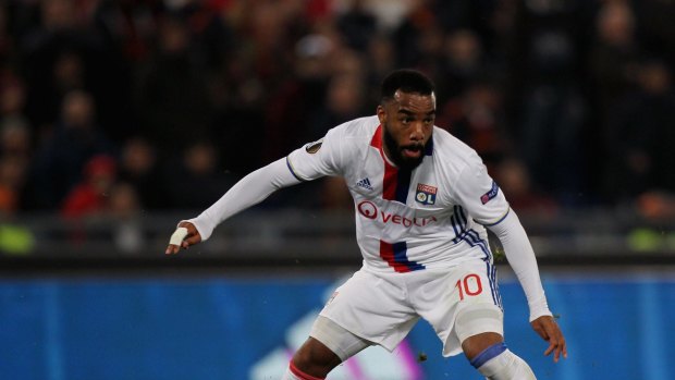 Plane ticket: Alexandre Lacazette will play for the Gunners in Australia.