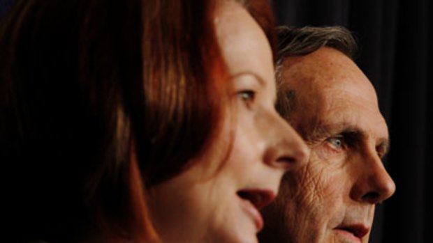 Greener pastures ... the Prime Minister, Julia Gillard, and Greens leader, Bob Brown, at a news conference yesterday.