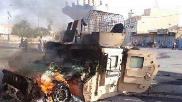 An Iraqi military vehicle burns after an attack by Islamic State militants in Anbar province last weekend.