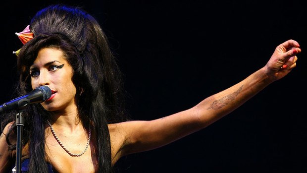Amy Winehouse performs at the Glastonbury Festival in 2008.