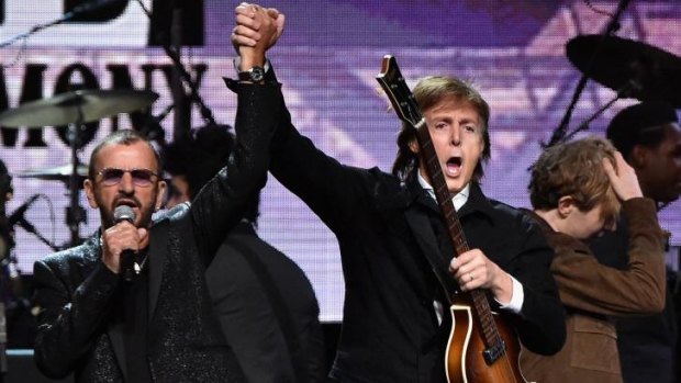 Sir Paul McCartney (right) and inductee Ringo Starr perform during the 30th Annual Rock And Roll Hall Of Fame Induction Ceremony in Cleveland, Ohio.