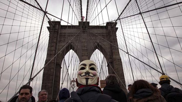 Protest ... an Occupy Wall Street activist on the Brooklyn Bridge.