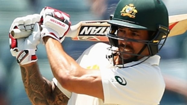 Mitchell Johnson on his way to 29 in his final batting innings, at the WACA.
