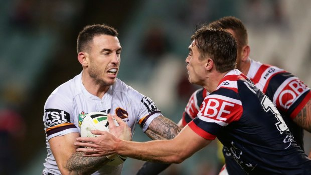Keeping the defence at arm's length: Darius Boyd.