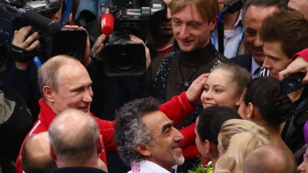 President Putin congratulates Russia's youngest ever Winter Olympic champion Yulia Lipnitskaya. 