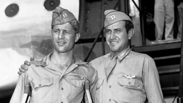 Arriving home ... Captain Louis Zamperini (right) and Captain Fred Garrett who were adrift 47 days in the Pacific after crashing during a mission against the Japanese. They were held in a Japanese prison camp for two years.
