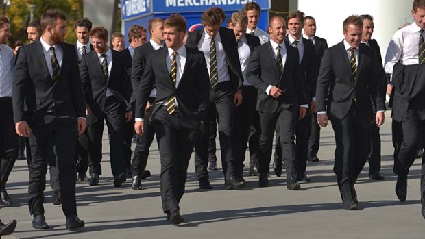 Richmond players arrive at the MCG.