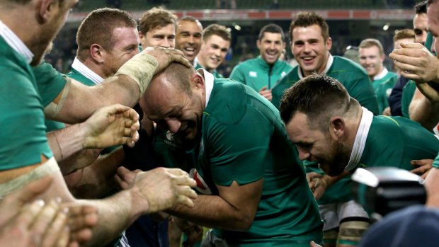 Party time: Ireland celebrate their famous win over the Wallabies.