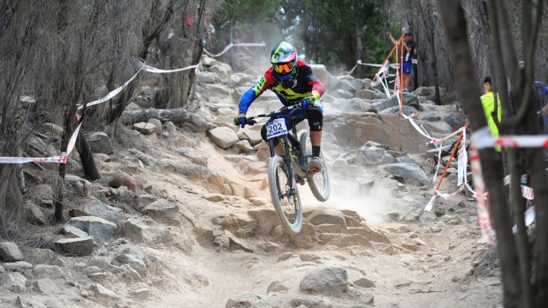 Dream job: Canberra's Jackson Frew on his way to winning the junior men's downhill at Stromlo on Sunday.