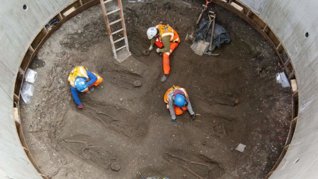 Archaeologists work to uncover skeletons from what is understood to be a mass grave for victims of the Black Death.