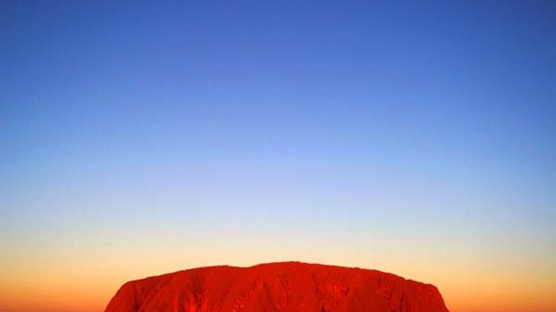 Tourism chiefs say a day will come when people will no longer be allowed to scale the Australia's iconic rock.