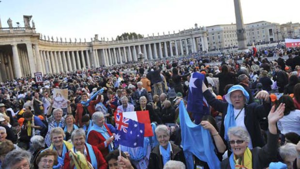 The colourful and exuberant Australian contingent among the 50, 000 people gathered in St Peter's Square yesterday. Mary MacKillop was one of six saints canonised.