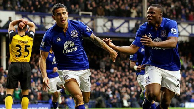 Tim Cahill with Victor Anichebe after scoring Everton's first goal against Blackburn.