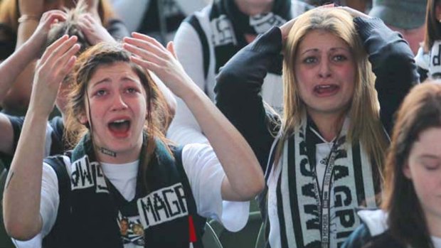 The agony of yesterday's result is etched on the faces of Collingwood fans at the Sidney Myer Music Bowl.