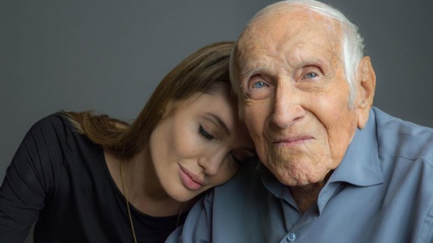 Angelina Jolie and Louis Zamperini, whose life story she will bring to the silver screen as director of <i>Unbroken</i>.