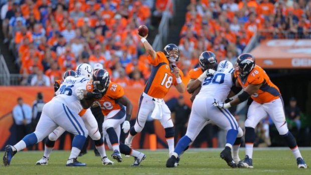 Manning up: Denver quarterback Peyton Manning passes against the Colts.