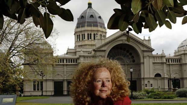 Carolyn Morwood outside the Melbourne Exhibition Building, where the first book of her crime trilogy is set.