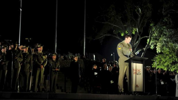 Victoria Cross recipient Corporal Ben Roberts-Smith, reading accounts from Australian soldiers, who have served in Afghanistan prior to the official start of the Dawn Service.