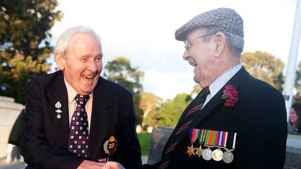 World War II veterans and brothers Tom and Charles McKay at the Kings Park Anzac Day dawn service. <i>Photo: Matt Tompsett.</i>