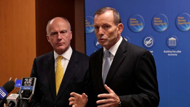 Opposition Leader Tony Abbott (right) and shadow workplace relations minister Eric Abetz release the Coalition's IR policy last month.